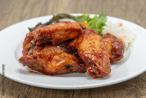 Hearty plate of glazed chicken wings cooked to perfection for a complete meal