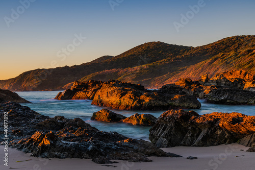 Sunrise seascape and a rocky beach