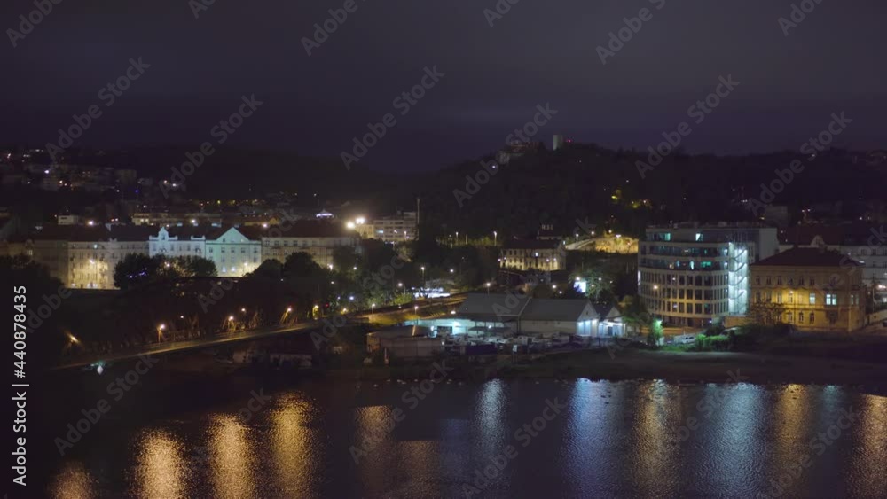 view of Vysehrad railway bridge and Vltava at night, pan right view of Vysehrad railway bridge and Vltava at night, pan right