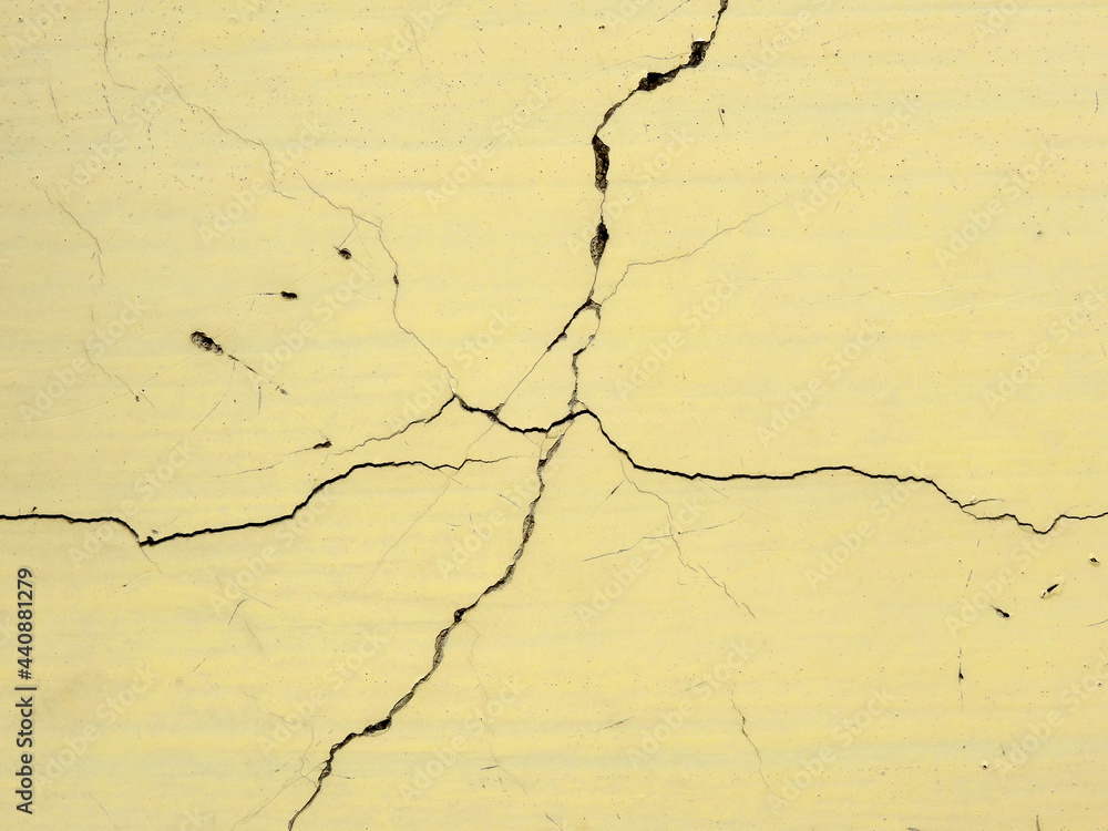 Obraz premium texture of yellow concrete wall with crack
