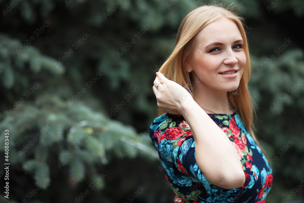 Fototapeta premium Girl in the street with an umbrella