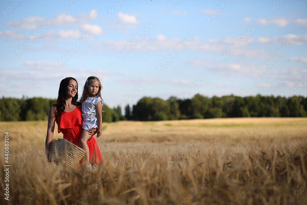 Summer landscape and a girl on nature walk in the countryside. Summer landscape and a girl on nature walk in the countryside.