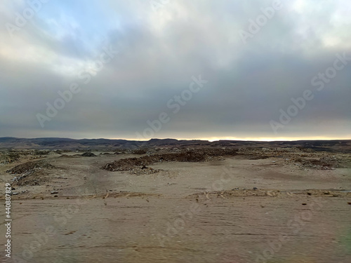 evening in the desert. cloudy sunset in the lut desert photo