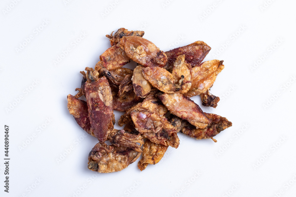 fried dried squid on a white background