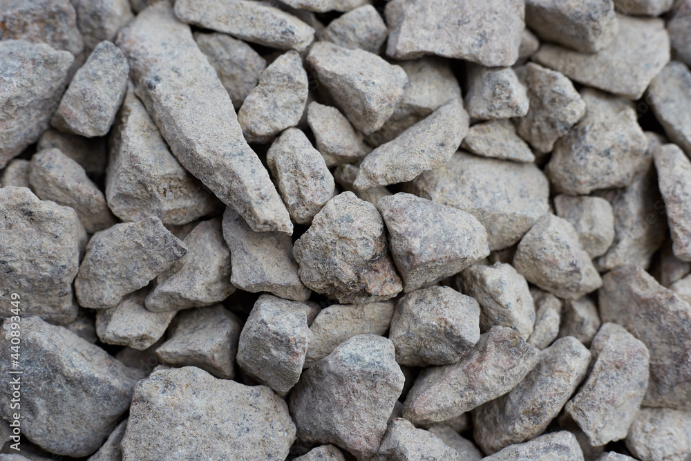 Crushed stone gray large stone for construction close-up, used for roads Crushed stone gray large stone for construction close-up, used for roads