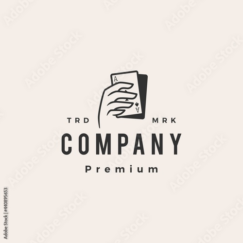 hand hold playing card poker hipster vintage logo vector icon illustration