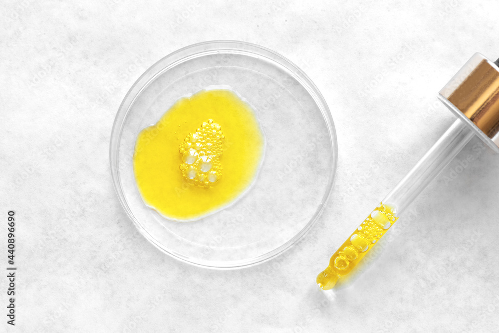 Liquid yellow retinol cosmetic serum Liquid yellow retinol cosmetic serum