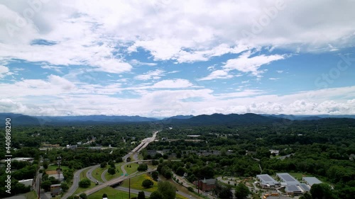 Mountains in the distance flying away from Asheville NC, Asheville North Carolina shot in 5.4 k photo