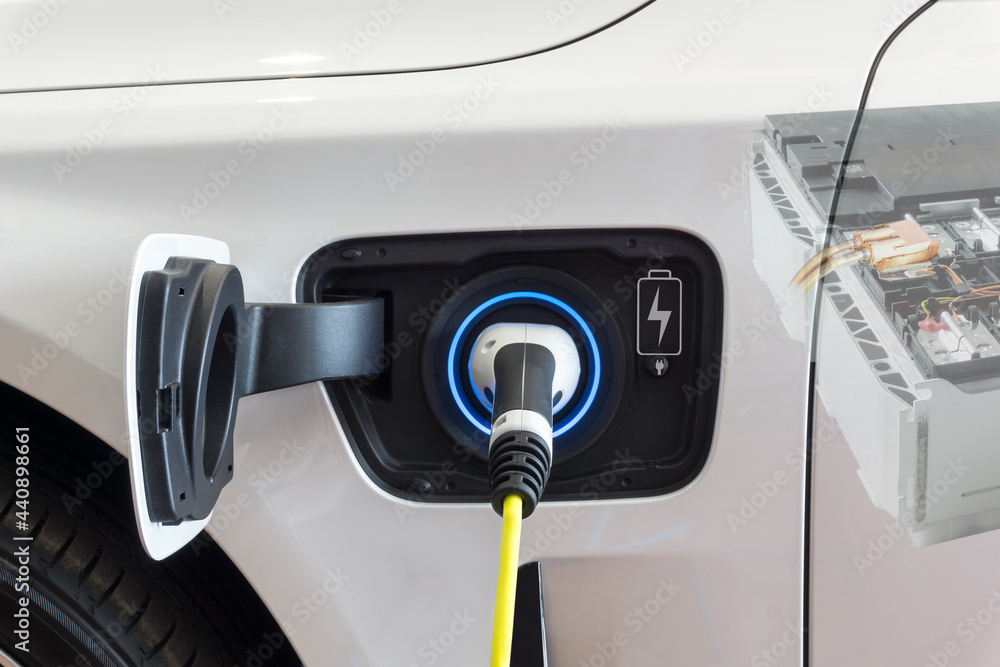 Close up Power supply connect to electric car for add charge to the