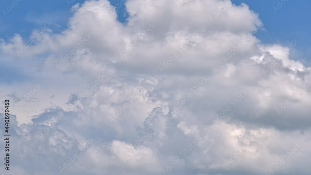 4K Time lapse, Beautiful motions white clouds on blue sky background. 4K Time lapse, Beautiful motions white clouds on blue sky background.