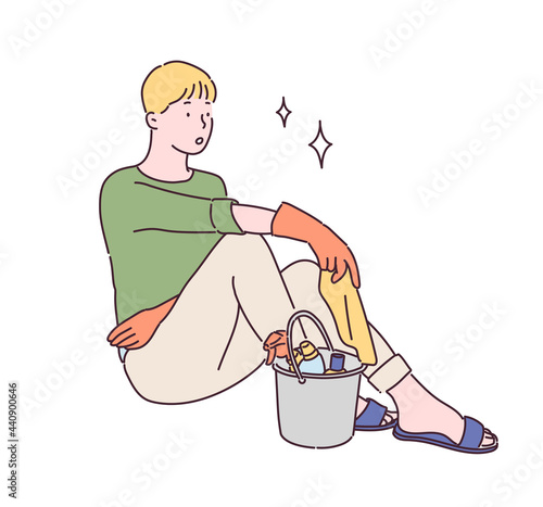 A man in rubber gloves is sitting with a tired face. In front of it is a bucket with cleaning tools. hand drawn style vector design illustrations. 