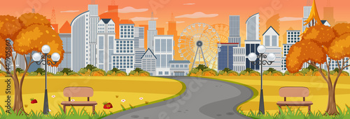 Horizontal scene with long road through the park into the town at sunset time