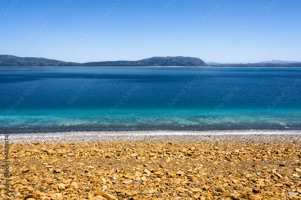 Lake Salda, Turkey. A popular place for recreation and tourism. White sand and blue water. Natural background.