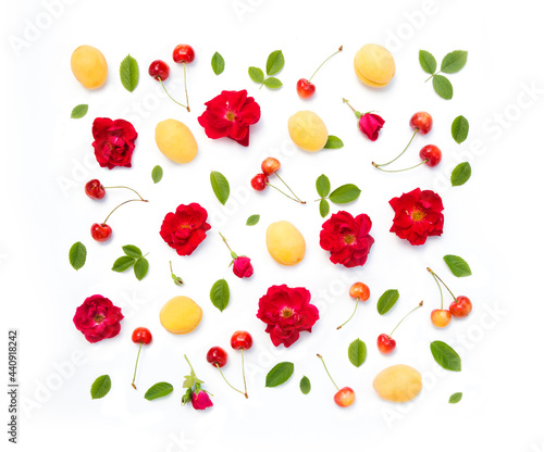 Flat lay  copy space. Summer composition with  berries sweet cherry  apricots  peaches on a beige background.