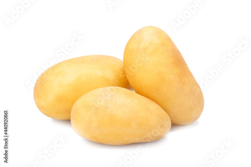 tubers of fresh new potatoes on a white isolated background.