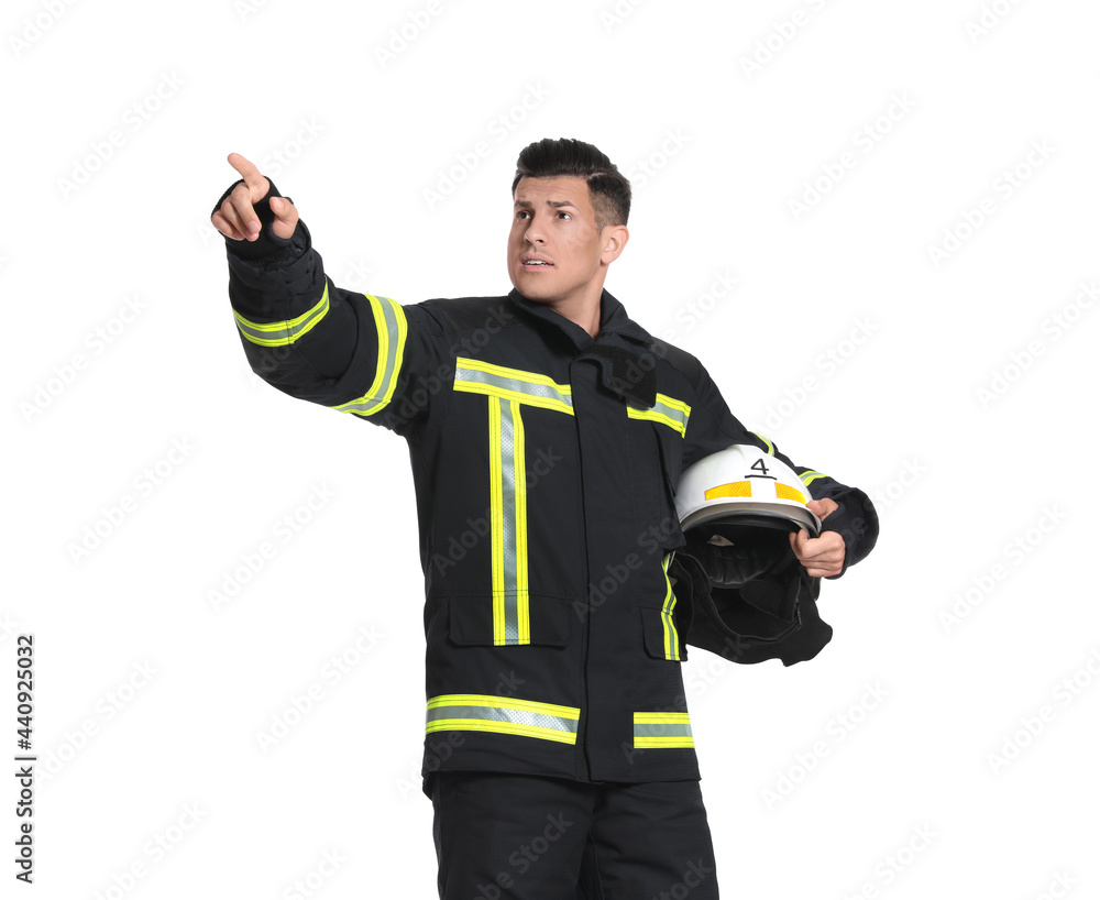 Portrait of firefighter in uniform with helmet on white background Portrait of firefighter in uniform with helmet on white background