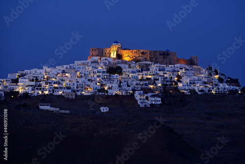 Astypalea island - night view of old castlle and Chora village on the hill top. Dodecanese