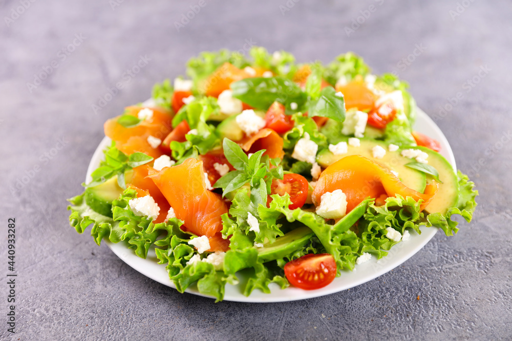 vegetable salad with smoked salmon, tomato and feta cheese vegetable salad with smoked salmon, tomato and feta cheese