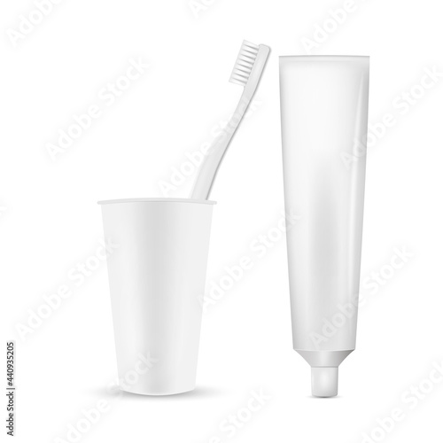 Vector realistic pair of toothbrushes in a glass with tube of toothpaste.Vector illustration isolated on white background.