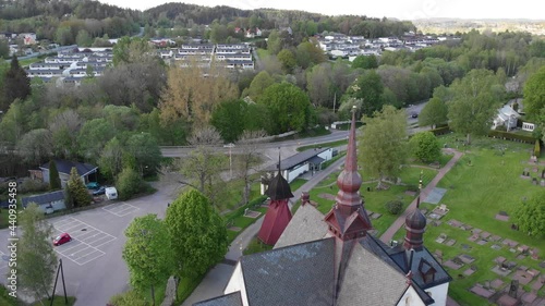 Church Tower And Lerum Cityscape in Sweden, Aerial Orbit photo
