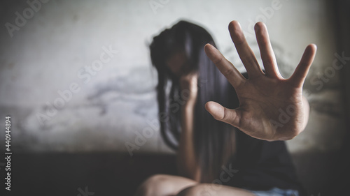 woman raised her hand for dissuade, The concept of sexual harassment against women and rape, stop violence against Women,sexual abuse, human trafficking, domestic, international women's day.