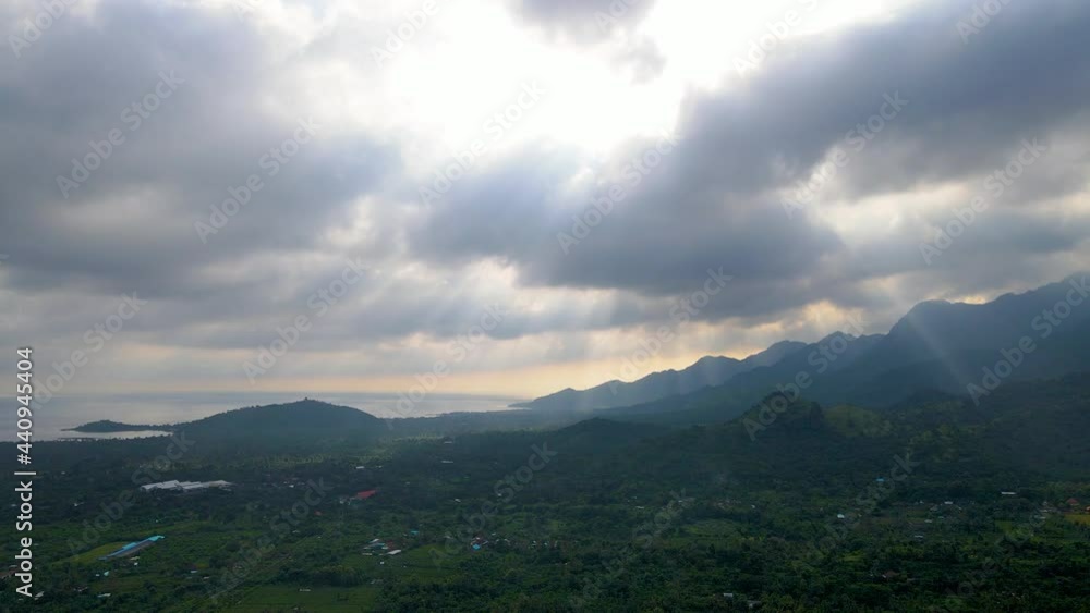 Fluffy Cloudscape And Green Nature Landscape In West Bali, Indonesia. aerial Fluffy Cloudscape And Green Nature Landscape In West Bali, Indonesia. aerial