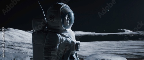 Tablou canvas Portrait of Asian lunar astronaut opens his visor while exploring Moon surface