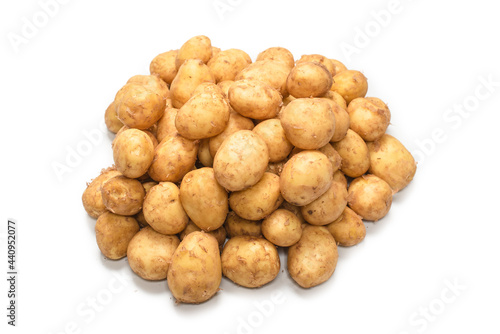 Raw potato isolated on a white background.
