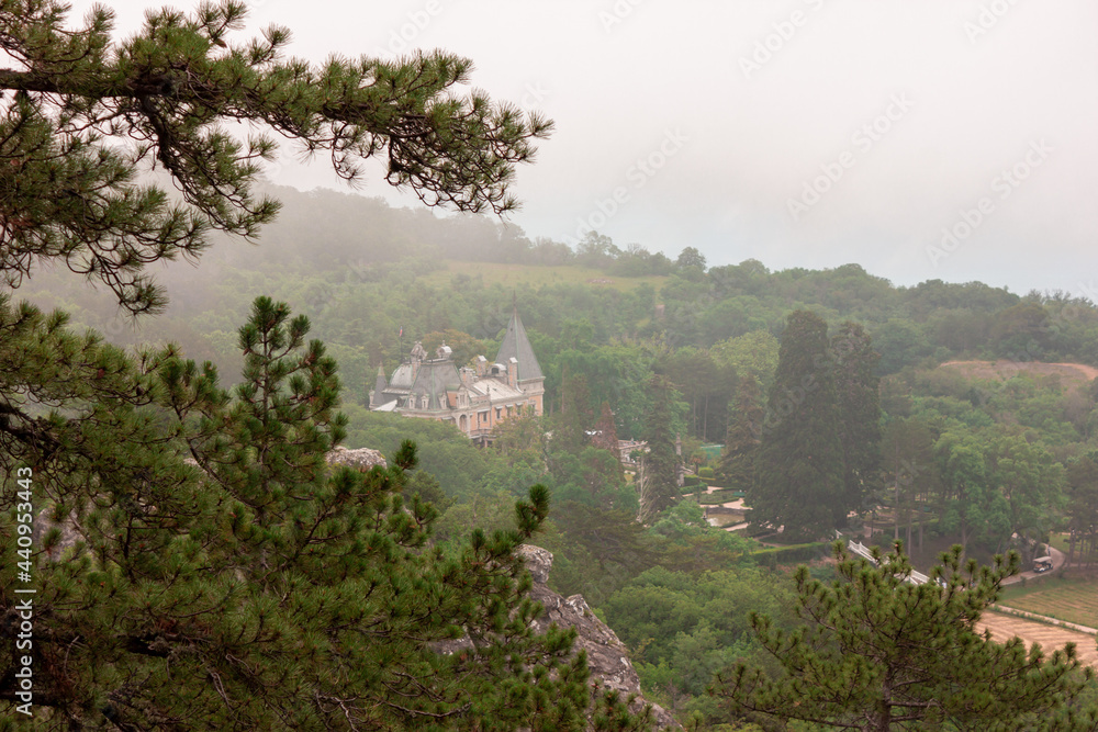 Obraz premium massandra palace top view, view from the mountain in the fog, the palace of Alexander the third
