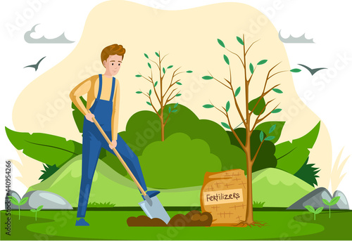Man with shovel digging hole in garden. Man buries seedling in ground for planting trees. Professional gardener worker applies fertilizer to pit. Farmer works in field. Spring farm work in yard