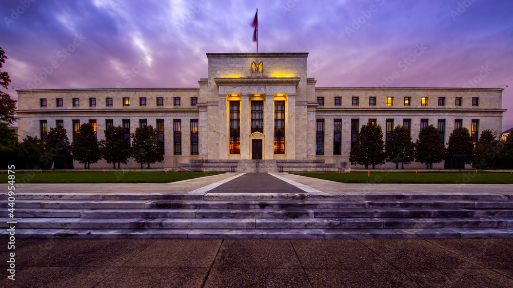 Front of the United States Federal Reserve Bank, the government agency that controls interest rates, at sunset in Washington DC in the Summer. - obrazy, fototapety, plakaty 