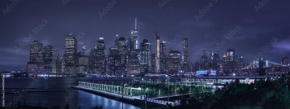 Panoramic of New York skyline and skyscrapers from New Jersey, at night, with neon noir effect