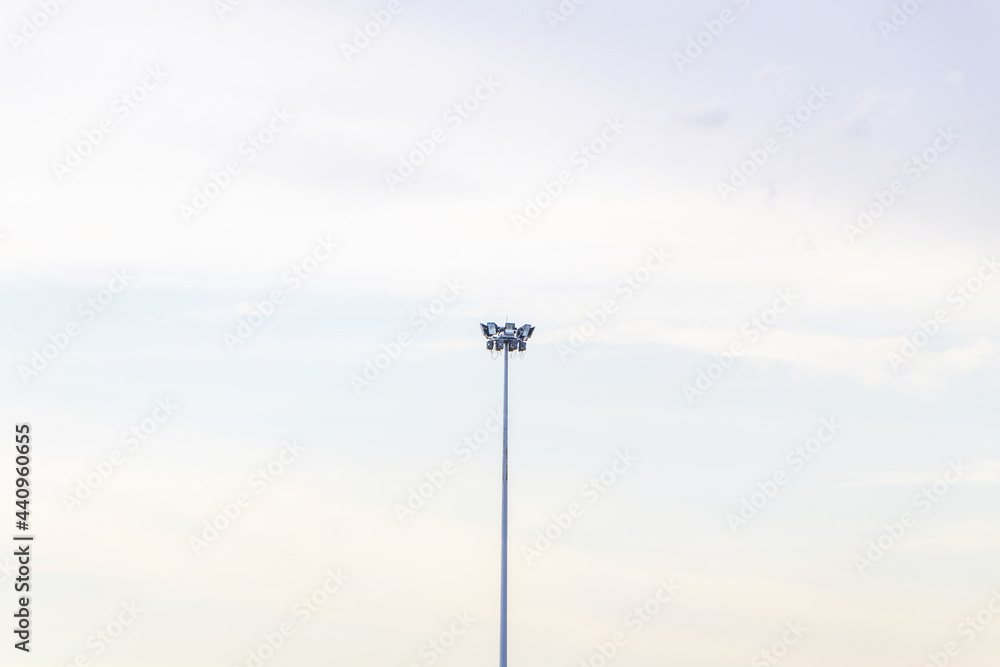 remote photo Spotlight pole above in the container yard in the port area the blue sky cloud background