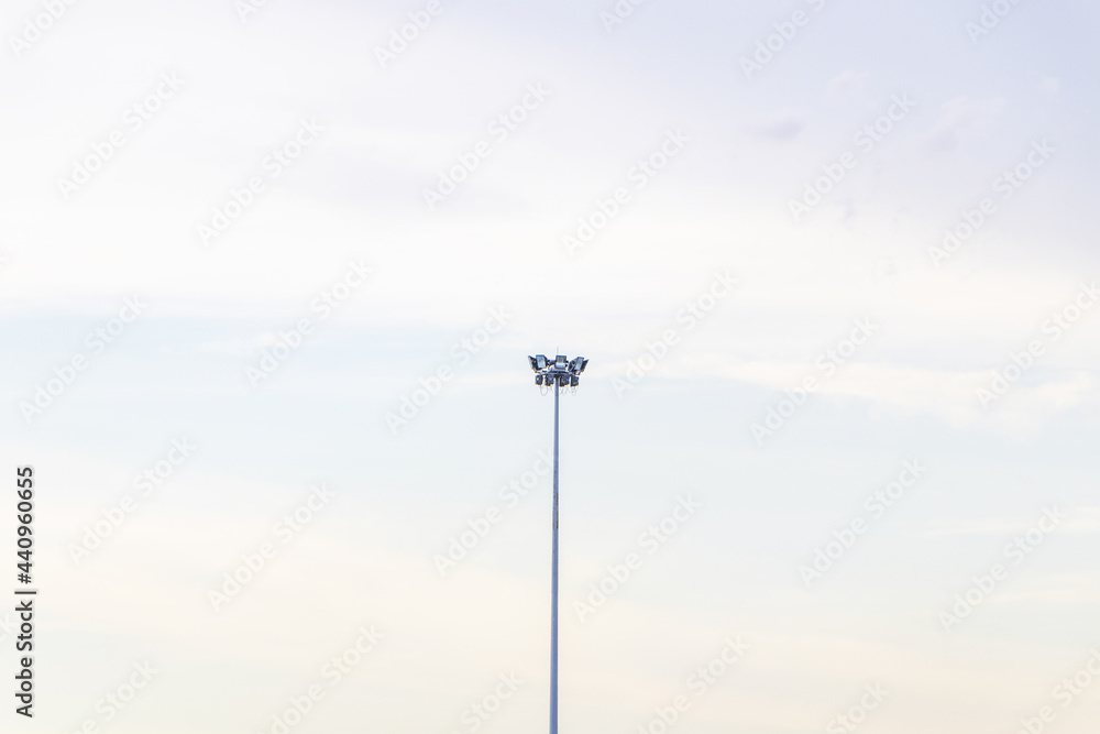 remote photo Spotlight pole above in the container yard in the port area the blue sky cloud background remote photo Spotlight pole above in the container yard in the port area the blue sky cloud background