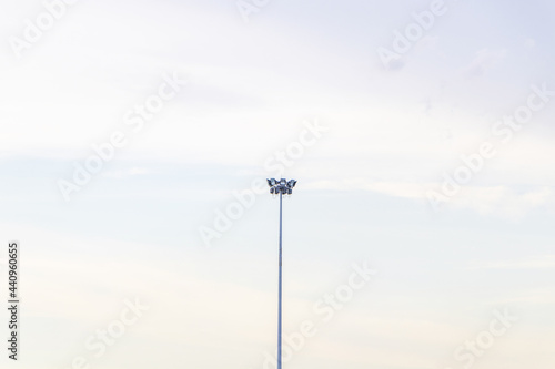 remote photo Spotlight pole above in the container yard in the port area the blue sky cloud background