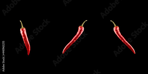 Pepper chili collection. Red hot chili paprika or spicy chile cayenne pepper set isolated on black background. Ingredient for fresh spice mexican food.