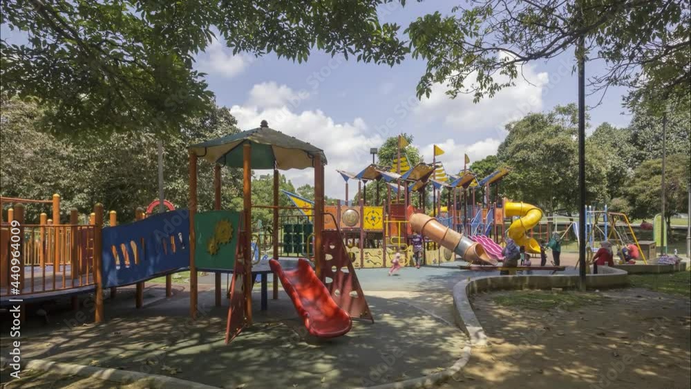 timelapse of colorful playground on yard in the park timelapse of colorful playground on yard in the park