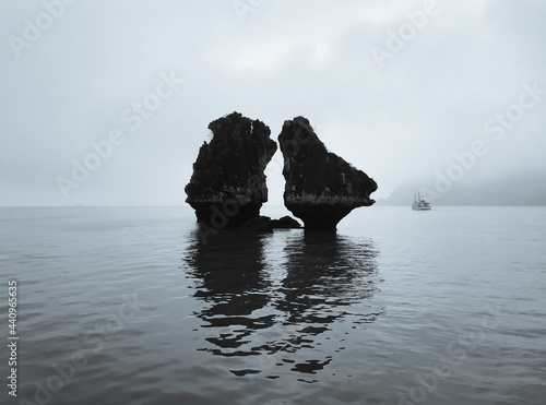 Rock formation in the ocean of Halong Bay photo