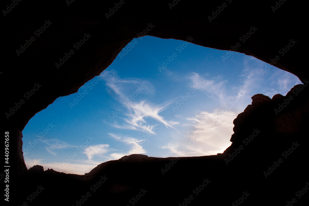sky through a cave opening. Sky view in the opening of cave. 