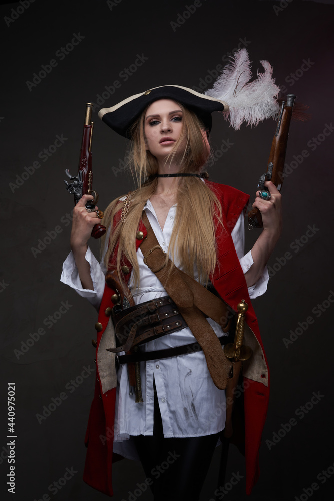 Obraz premium Caribbean female pirate with red coat and tricorn