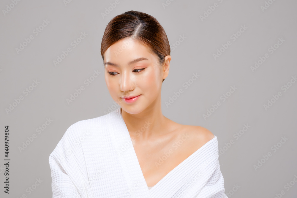 Beauty asian face young beautiful woman skin natural make up.  close up fpretty portrait spa and salon in bathing suit. beautiful skin care cosmetic concept.Gray background. Smile happy mood.