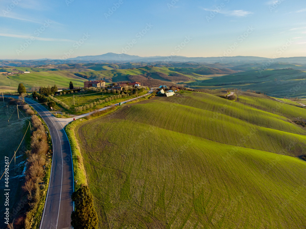 Siena, Tuscany- April 10 2021: aerial view of the hills and lakes of the province of Siena in the Crete Senesi in spring