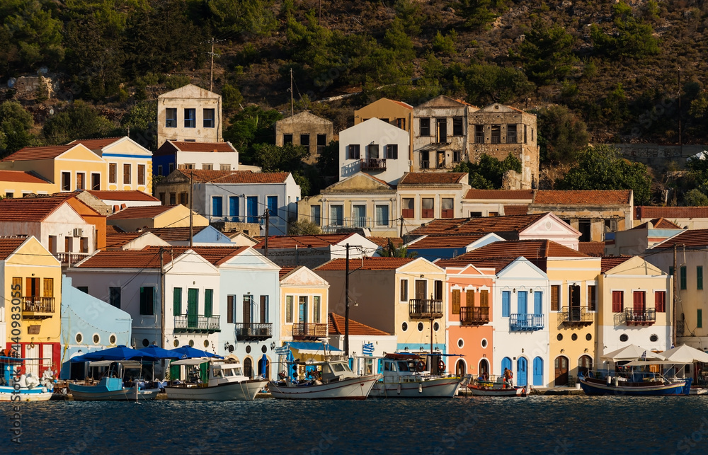 View of the village with colorful houses on the harbor on the Greek island of Kastellorizo in the Dodecanese