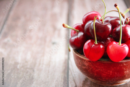 Obraz na plátně natural red cherry fruit with green peduncle