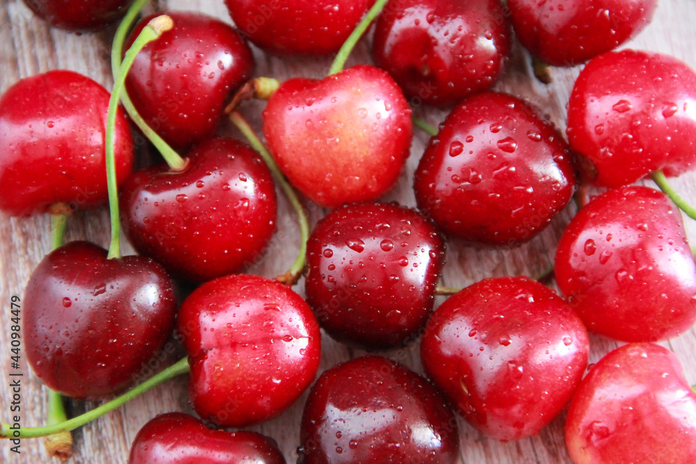 natural red cherry fruit with green peduncle natural red cherry fruit with green peduncle