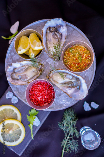 Oyster with spicy dipping sauce in Thai style  photo