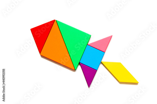 Color tangram puzzle in shape rocket or missile on white background