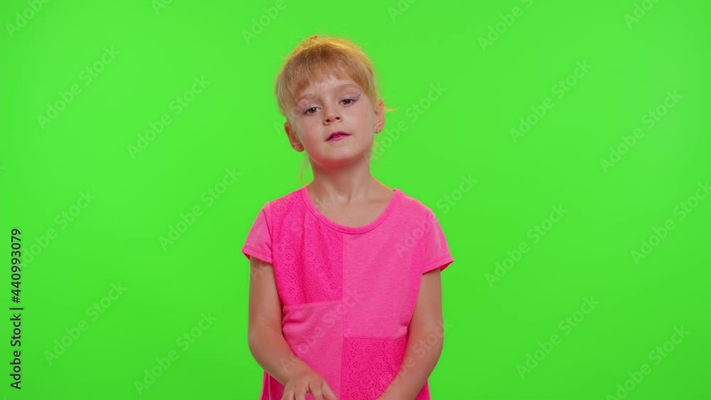 Child girl playing push pop it bubble fidget toy and meditating. Stress anxiety relief squeeze sensory toys for education and development for children kids. Silicone anti-stress game simple dimple Child girl playing push pop it bubble fidget toy and meditating. Stress anxiety relief squeeze sensory toys for education and development for children kids. Silicone anti-stress game simple dimple