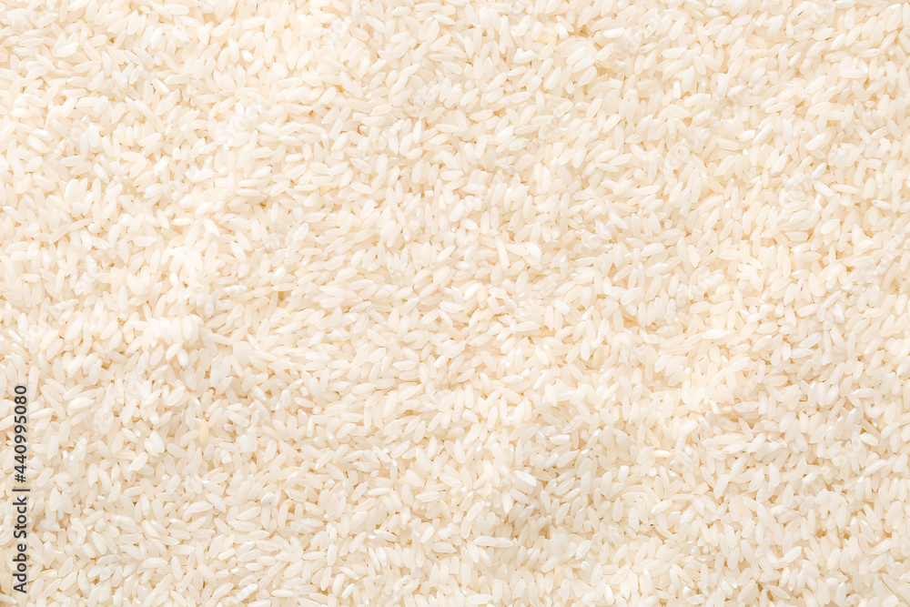 Raw rice as background, closeup Raw rice as background, closeup