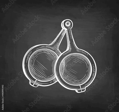 Chalk sketch of medieval spectacles.